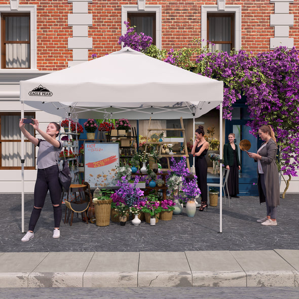 EAGLE PEAK 10x10 Commercial Ez Pop Up Canopy Tent Instant MarketPlace Canopies with Wheeled Roller Carry Bag, Bonus 4 Sand Bags, White